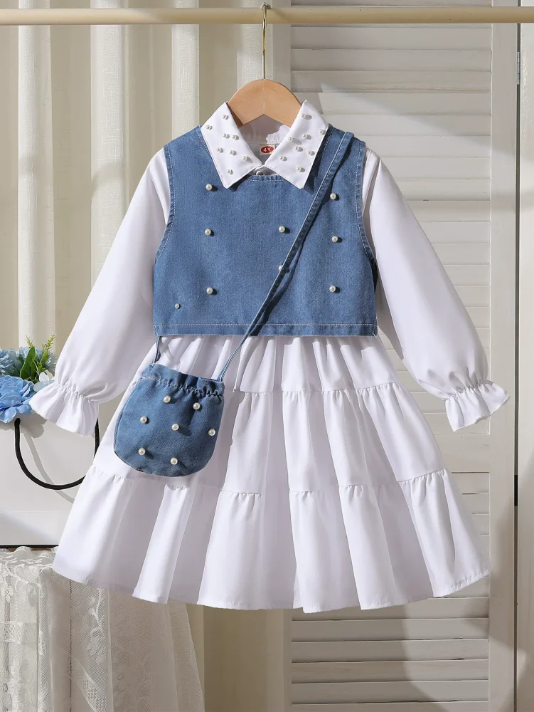 Blue three-piece suit, vest, shirt dress, shoulder bag