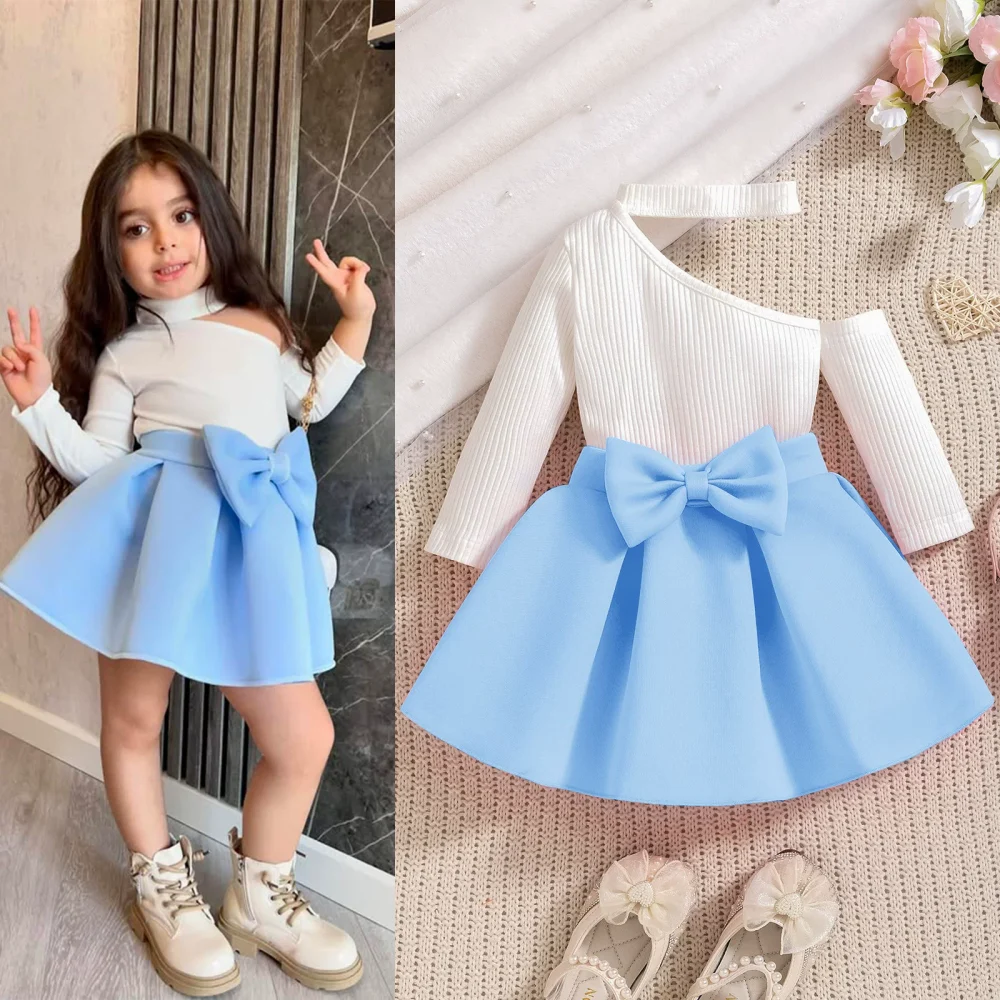 Sky blue two-piece suit top and skirt