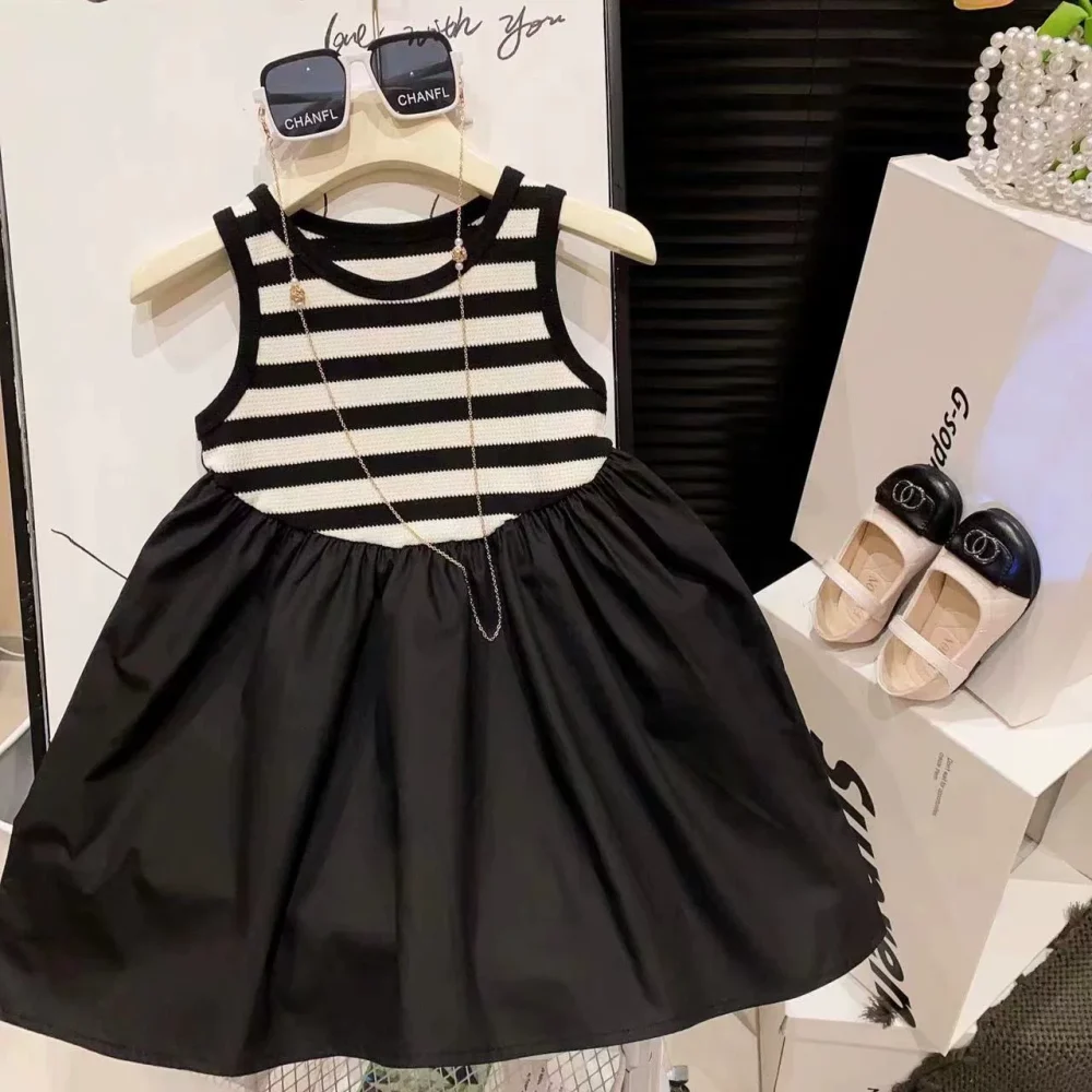 Striped black dress (necklace not included)