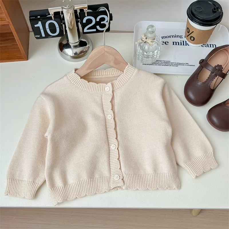 beige sweater