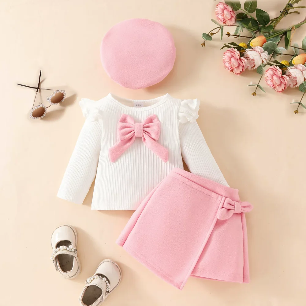 Pink three-piece suit, skirt, hat, long-sleeved top